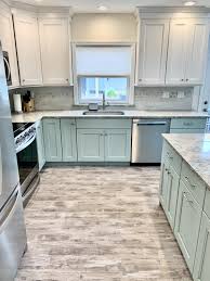 replace or refinish my kitchen cabinets