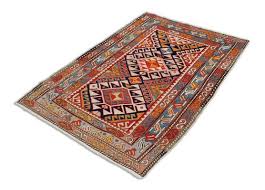 antique geometric dark blue kazak rug