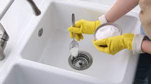 clean your kitchen sink drain
