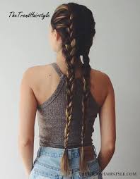 A somewhat messy part and braiding technique. Side Bun With Double Loose Braid 40 Two French Braid Hairstyles For Your Perfect Looks The Trending Hairstyle