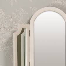 The cheapest offer starts at £10. Triple Vanity Mirror Daventry Cream Range Melody Maison