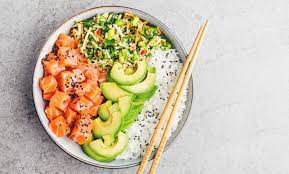 salmon poke bowl with rice and avocado