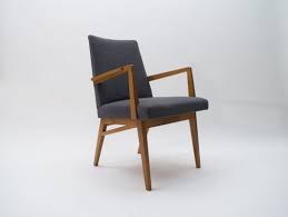 This model was released in 1951 and features a teak wood frame with danish cord seat. Mid Century Modern Wood Armchair In Grey Fabric Germany 1950s For Sale At Pamono