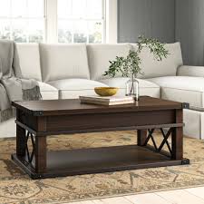 Hidden casters make it easier to move the table. Bridget Solid Wood Lift Top Coffee Table Reviews Birch Lane