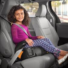 child sit in a backless booster seat