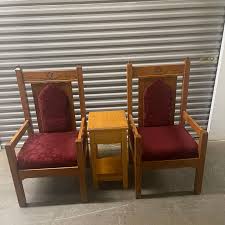 reddish fabric church chairs and