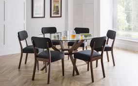 This large round dining table constitutes a stylish wooden proposition, that reflects well the traditional style in design. Chelsea 140cm Round Glass Dining Set With 6 Farringdon Chairs 616 00 Go Furniture Co Uk