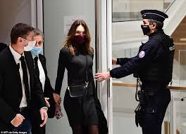 Sarkozy and his wife carla bruni greet president barack obama at the g8 summit dinner in deauville, france, 26 may 2011. Carla Bruni Dresses In Black As She Arrives Alongside Nicolas Sarkozy At French Court Daily Mail Online