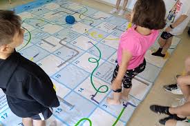 a watery snakes ladders floor game