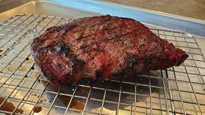 smoked ribeye steak on a pellet grill