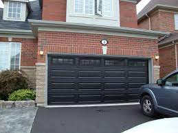 houses with black garage doors for