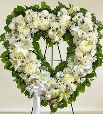 Sympathy flowers themed in white. Angelic All White Flowers Heart Wreath C2415 Funeral Flower Arrangements