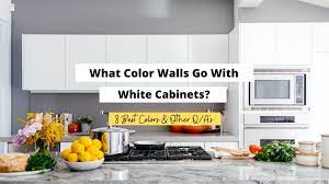 what color walls go with white cabinets