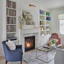 Fireplace With Glass Bookcases Design Ideas
