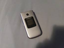 You can launch bixby voice, activate the camera, or open an app by pressing the side key. Found An Old Samsung Flip Phone On The Sidewalk It Still Works But There Is A 4 Digit Code Can Anyone Help R Mystery