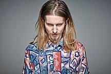 Although blonde hair is often associated with the surfer dude persona, the best haircuts for blonde guys really extend. Portrait Of Starring Young Man With Long Blond Hair And Beard Rhf001654 Rainer Holz Westend61