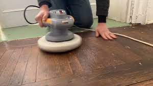 waxing a really beat up wood floor that