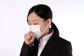 フリー写真] マスクをつけて咳をしている女性社員でアハ体験 - GAHAG | 著作権フリー写真・イラスト素材集