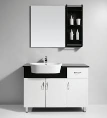 The cantilever effect is carefully done, and the mirror reflects the black tile walls opposite the vessel sink. House Window Glass Replacement Black And White Bathroom Vanities