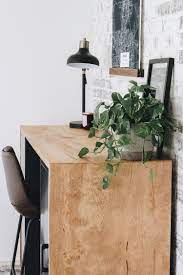 Plywood is a material manufactured from thin layers or plies of wood veneer that are glued together with adjacent layers having their wood grain rotated up to 90 degrees to one another. Diy Plywood Desk Within The Grove
