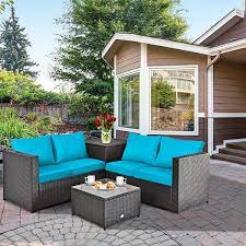 Costway 4 Piece Outdoor Patio Rattan Furniture Set Cushioned Loveseat Storage Table Brown Turquoise