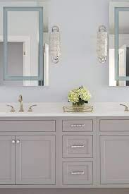 Blue Master Bath With Bling Sconces
