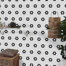 The ceramic floor and wall tile feature marbleized gray veining on the white and black squares. Cheap Black And White Hexagon Ceramic Tile Kitchen Floor Manufacturers And Suppliers Wholesale Price Black And White Hexagon Ceramic Tile Kitchen Floor Hanse