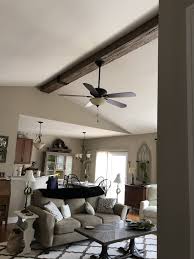 installing a ceiling fan through a beam