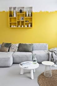 Brown and a few touches of grey, yellow, black and red. Yellow Walls Gray Floor Google Search Yellow Accent Walls Interior Yellow Interior