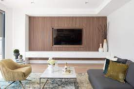 Wood Slat Accent Wall Surrounds The Tv