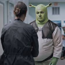 dying dad in a shrek costume
