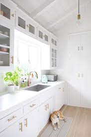 a 1950 s kitchen gets a bright white
