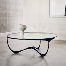 A coffee table like this works every time, she explains. Memphis Round Contemporary Coffee Table Furniture By Tom Faulkner