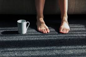 fix a squeaking floor under carpet