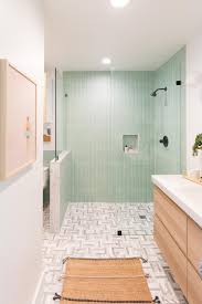 This large square bathing room features a large clawfoot tub, pedestal sink, and plenty of floor space for wrangling kids into the bathtub. Our House Guest Bathroom Remodel Reveal Sugar Cloth