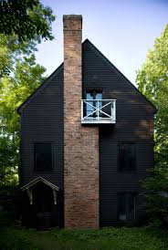 Gray, brown or black roofs look good with green siding; Red Brick Houses With Black Trim Design Indulgence