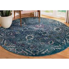 vine faded turquoise area rug