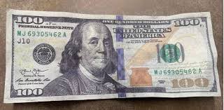 riverton bank warns of counterfeit 100