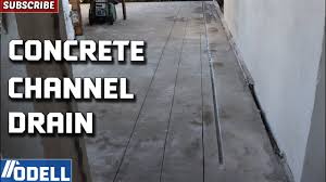 drainage channel into a concrete slab
