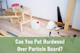put hardwood over particle board
