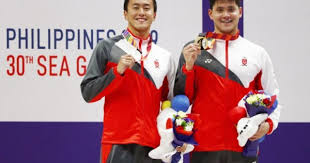 Schooling, who failed to qualify for the 100m semifinals at the world championships, looks to be better prepared to defend his olympic gold medal. Olympic Bound Swimmers Joseph Schooling Quah Zheng Wen Granted Ns Deferment Till 2021 Singapore News Asiaone