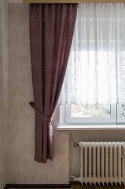 old fashioned curtains in an empty