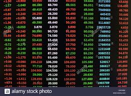 Colored Stock Chart Ticker Board On Black Stock Photo