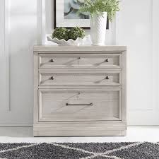 A white file cabinet is ideal for a casual space, while a black filing cabinet works for a formal vibe. Harvest Home Bunching Lateral File Cabinet Cottonfield White Liberty Furniture Furniture Cart