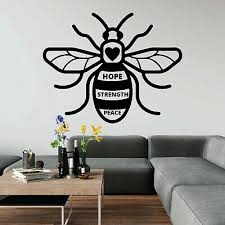 manchester bee symbol charity strength