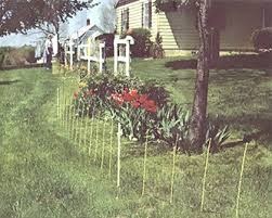 The strings help you line up the posts. The Art Of Electric Garden Fences Do It Yourself Mother Earth News