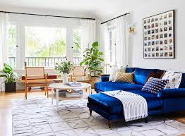 style blue velvet sofa in a living room