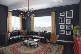The minimalist room remains enticing with black and grey application for the furniture, the flooring, and the walling. Beautiful Blue Living Room Ideas