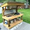 If all you really need is a small outdoor kitchen, this little grilling island is for you. 3