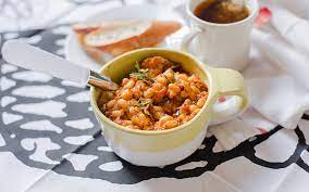 White beans are cooked in a slow cooker with smoked neck bones, aromatic vegetables, seasonings, and chicken broth. Stewed Great Northern Beans With Harissa Vegan Gluten Free One Green Planet